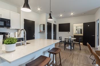 White Quartz Kitchen Counters at Uptown Square Apartments, Troy